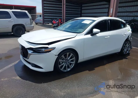 2022 Mazda Mazda3 Premium from USA, damaged, VIN 3MZBPBDL2NM309748